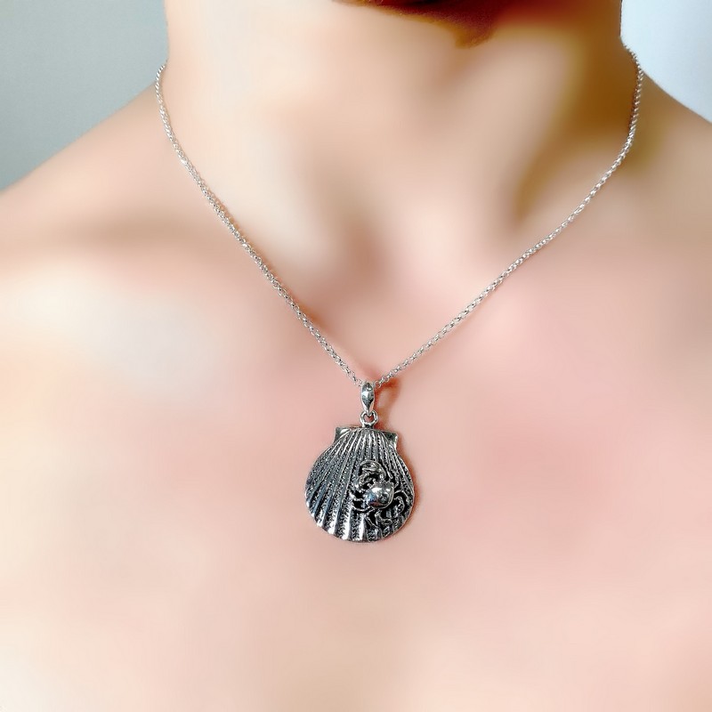 crab on shell pendant